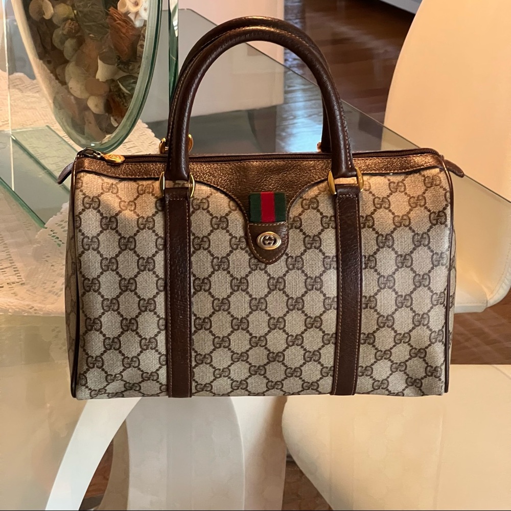 💯% authentic Gucci bag .